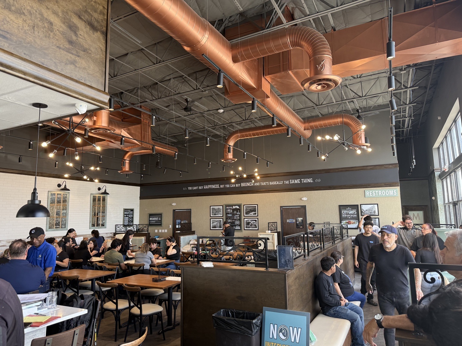 Another Broken Egg Café dining room with copper ductwork, El Paso